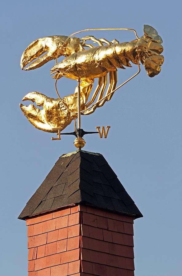 lobster Gold lobster weathervane atop a rooftop
